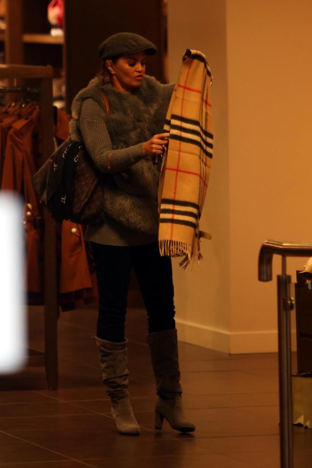  The 44-year-old was spotted looking at an over-sized scarf