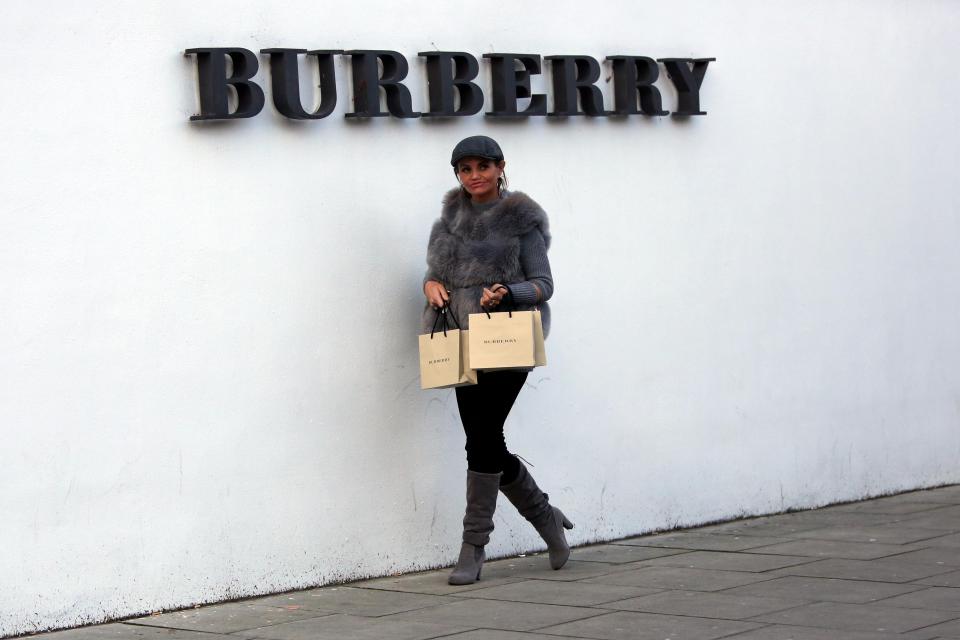  She left the shop carrying two Burberry bags