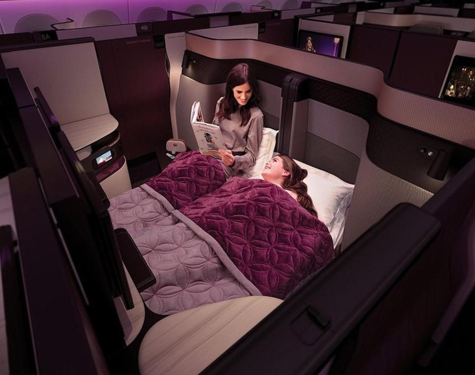 In the Business Class cabins, customers in adjoining seats can create their own double bed 