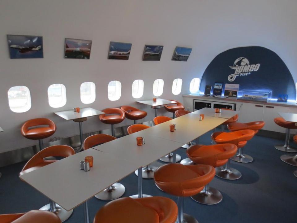 There is a cafe inside the plane that serves breakfast, coffee, cookies, ice cream, sandwiches and hot meals