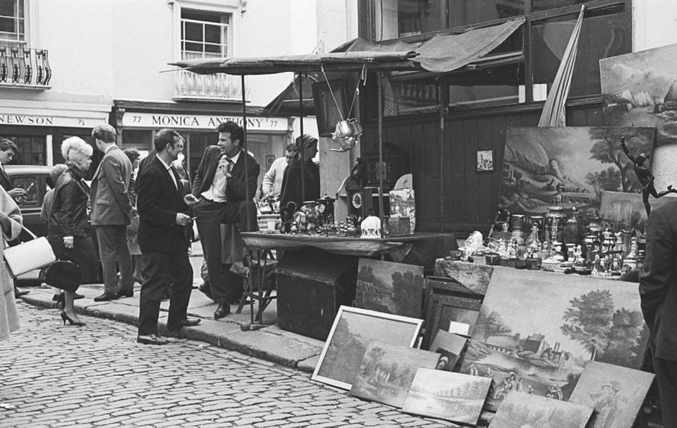  Many of those who were pictured attending on-street market were seen were formal clothing