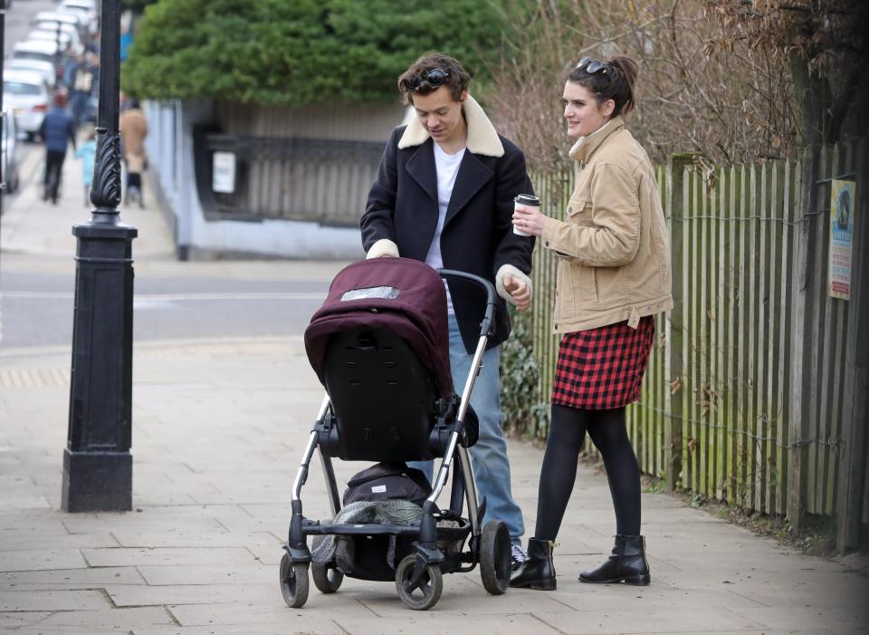  Harry couldn't keep his eyes off the adorable tot