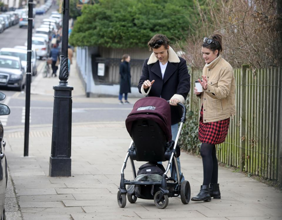  Harry tried to keep the baby entertained