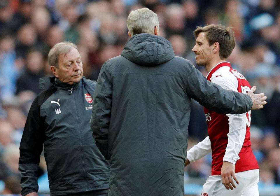 Monreal grimaces as he backs out of the Carabao cup final 