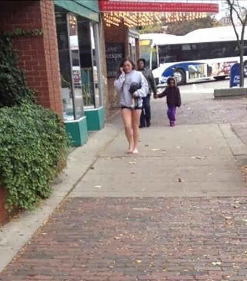  One woman takes to the pavement barefoot