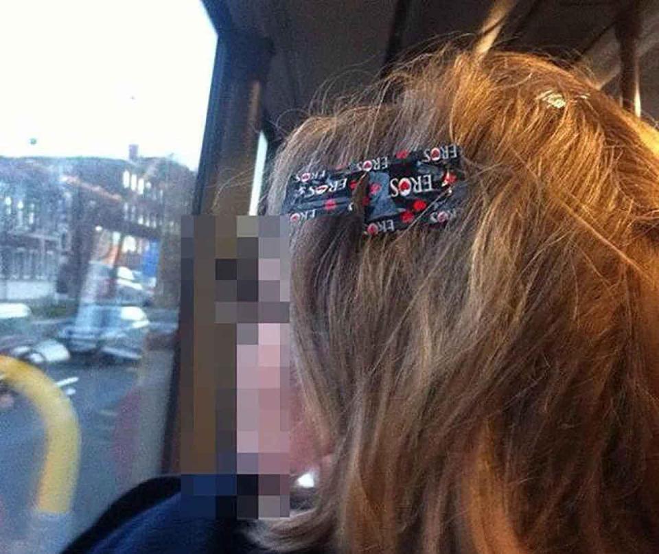  One reveller takes the bus, completely unaware of the condom packet stuck in her hair.