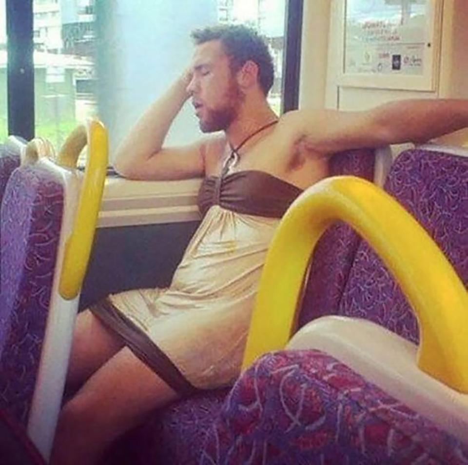  One man nods off on the bus as he heads home wearing a halterneck dress.