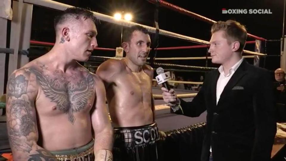 Scott Westgarth (centre) initially appeared fine when giving his post-fight interview