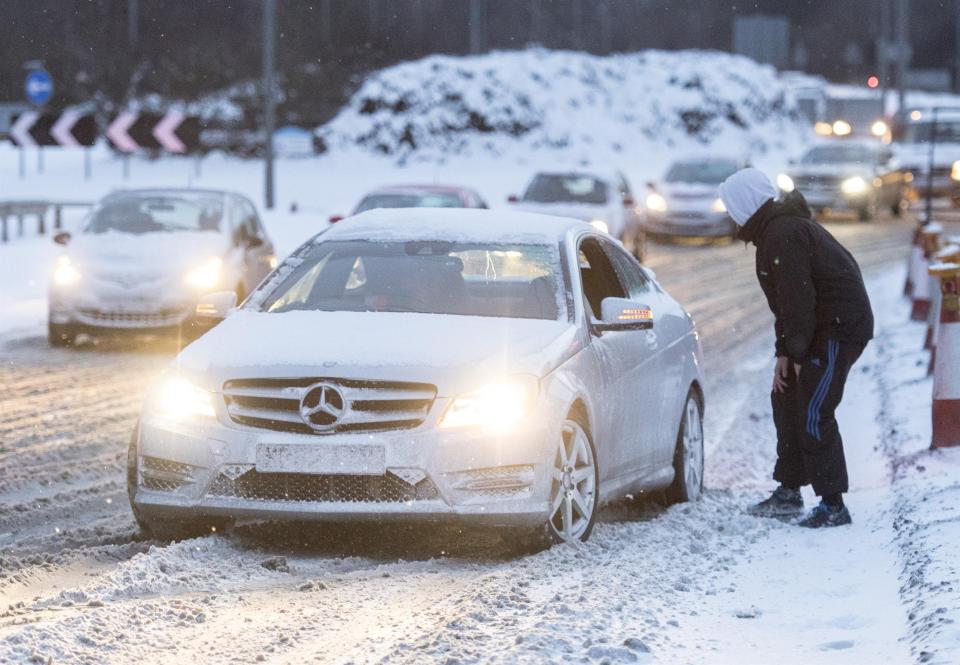  Cars make their way through snowy conditions in Teesside today