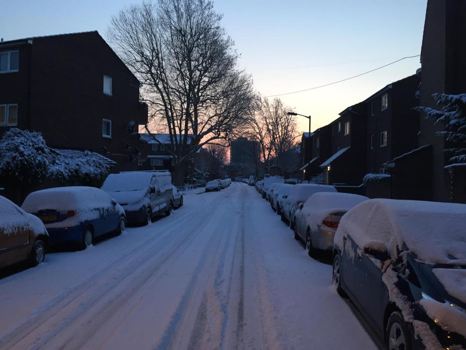  The sun rises over snowy Peckham in South London today