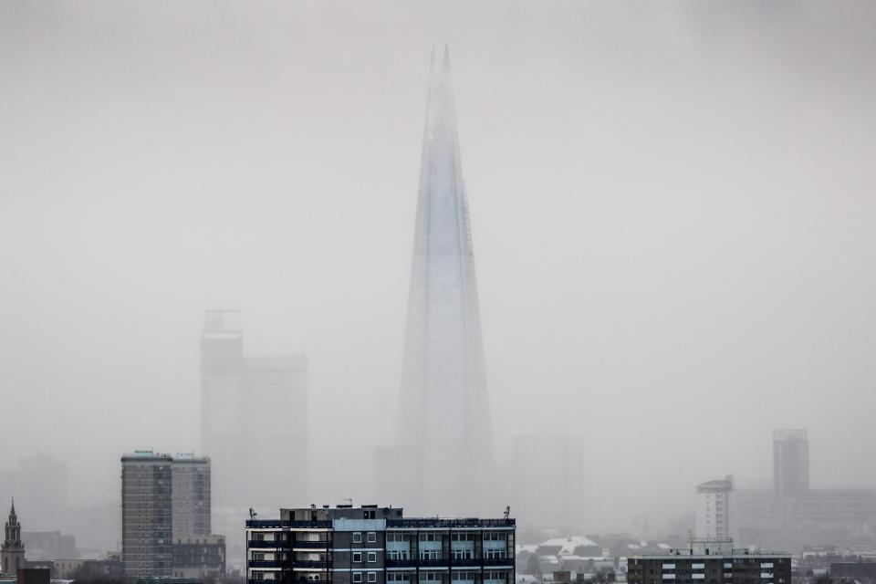  The Shard is barely visible through the freezing cold air across London