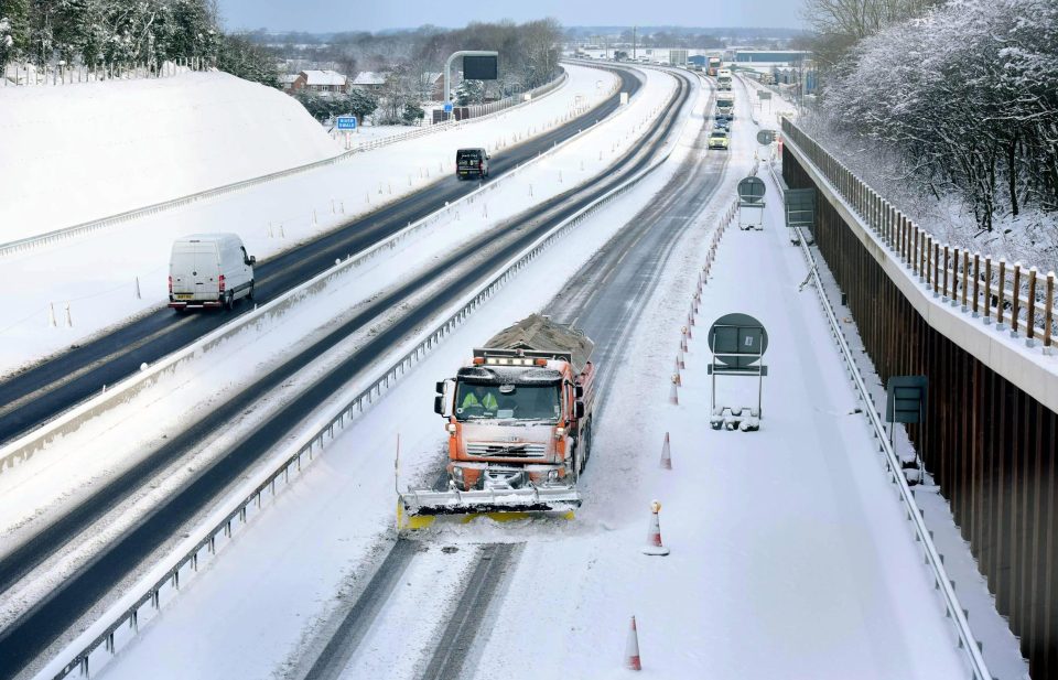  A snow plough attempts to clear the A1(M) near Catterick, North Yorkshire