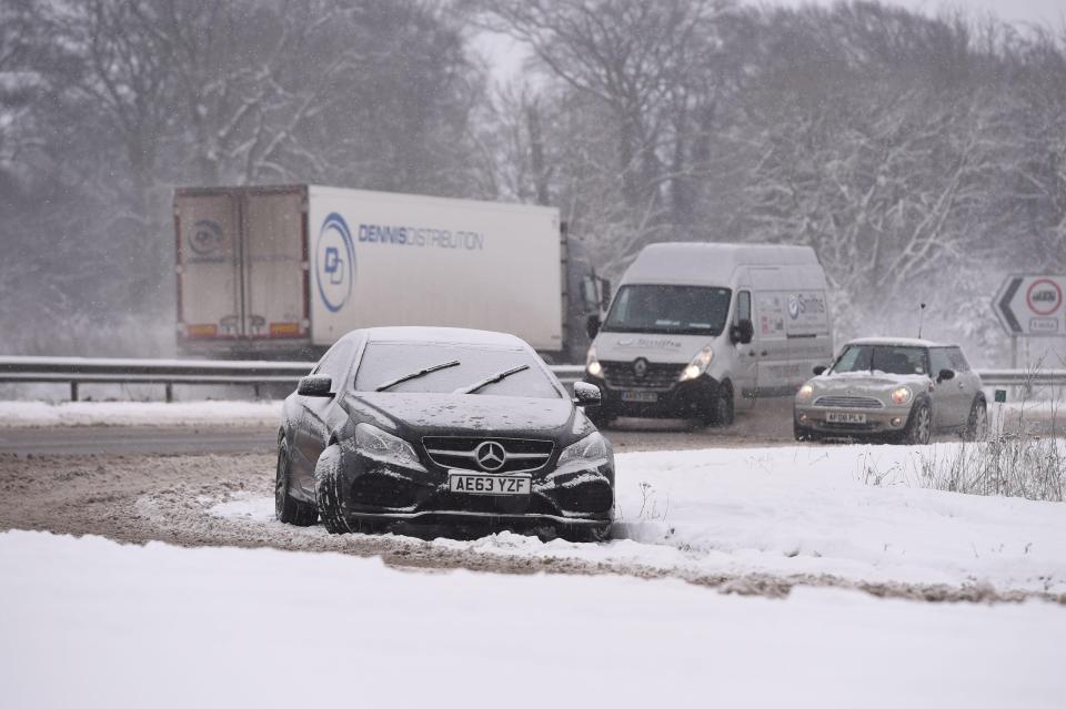  An abandoned car on the A1 near Peterborough as wintery weather brings more misery for motorists