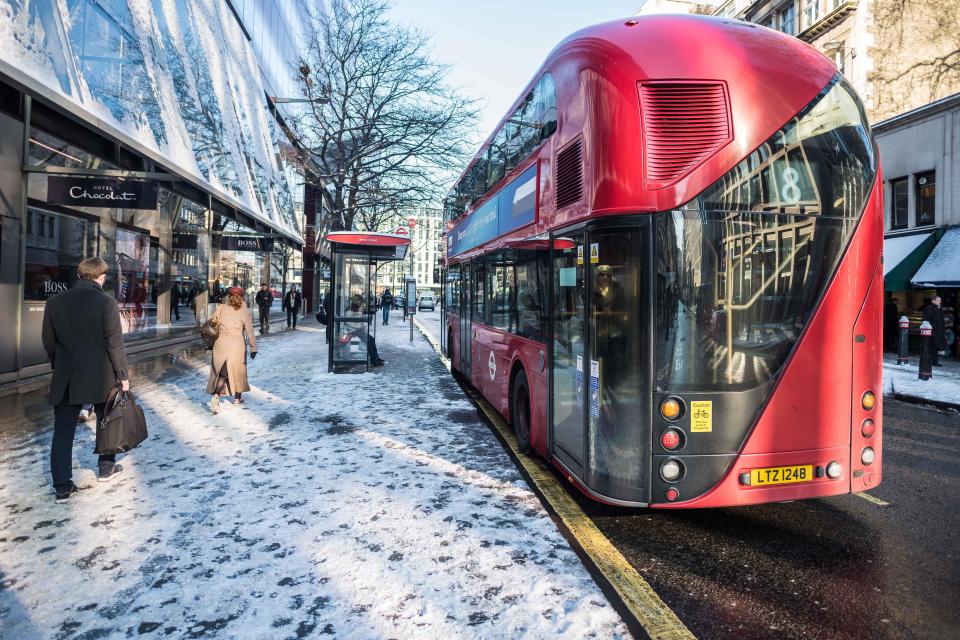  Snow falls near St Paul's Cathedral in London