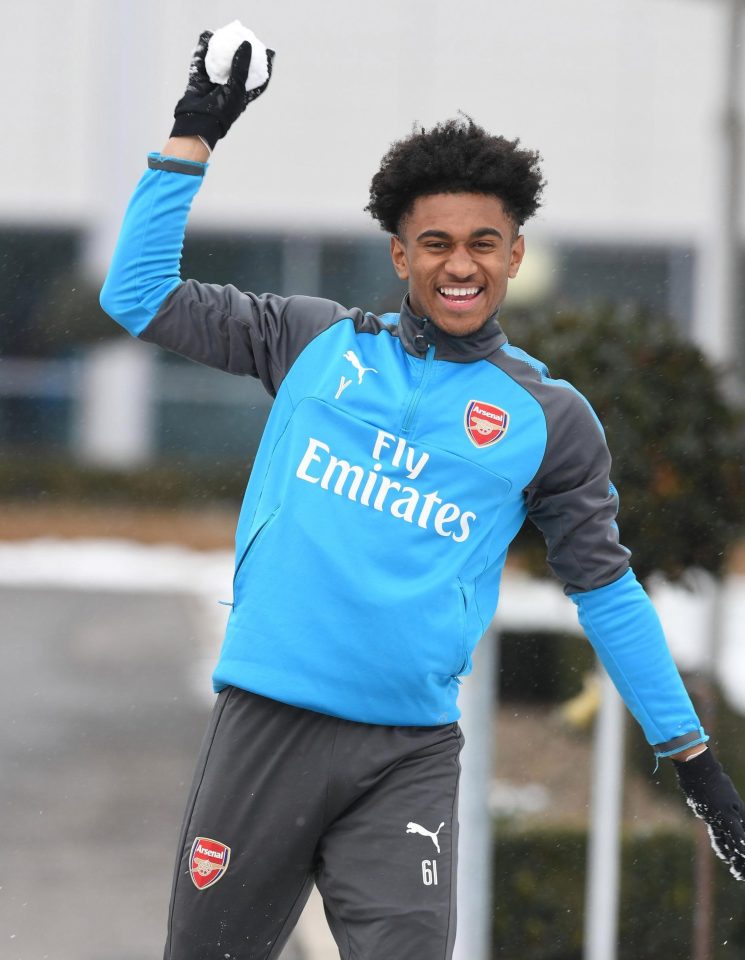  Arsenal star Reiss Nelson was all smiles during training at London Colney