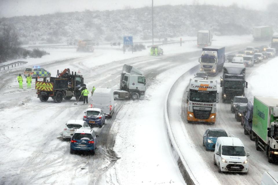  A jackknifed lorry out on the M80 Haggs in Glasgow, as the highest level of weather warning has been issued for Scotland and Ireland