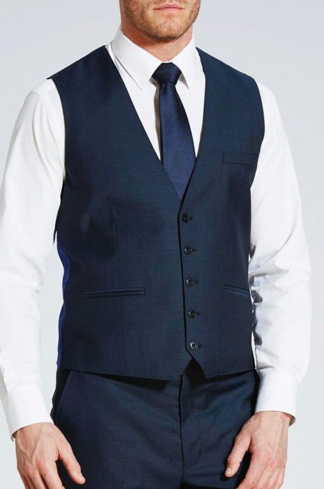 Italian wool waistcoat includes a blue twill lining, five button fastening and an adjustable back strap