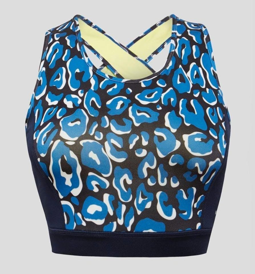 This active leo-print crop has back detailing. with antibacterial moisture wicking and stretch