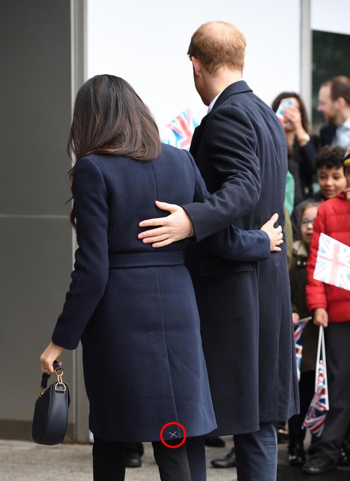 Meghan Markle made the rookie error of not undoing the tacking stitch before wearing her navy coat out