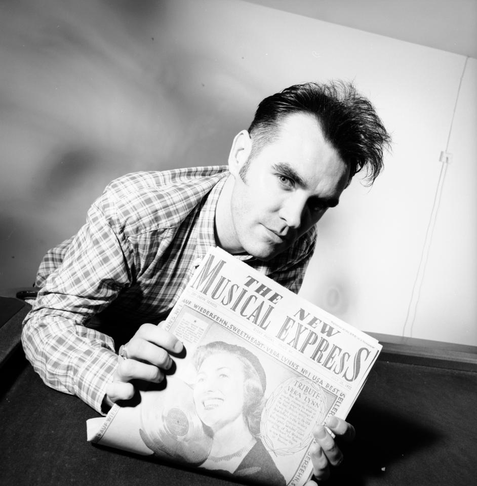  Morrissey with a 1952 copy of the magazine to commemorate its 40th birthday in 1992