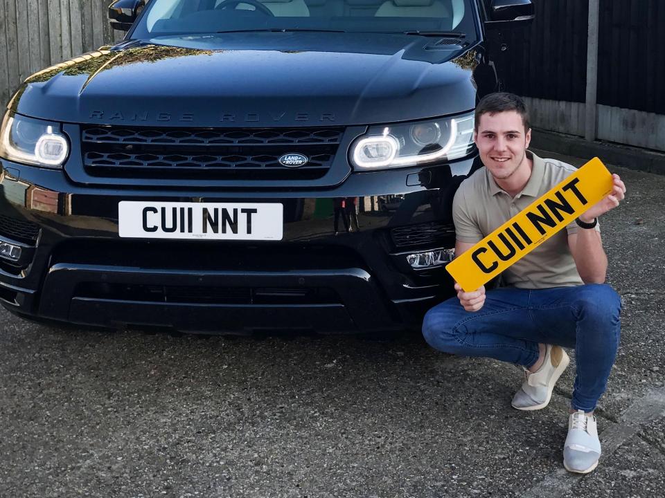  Britain's most offensive plate, held here by number plate dealer Jake Smith, is no longer road-legal