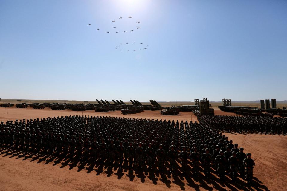  Soldiers take part in a massive military parade to mark the 90th anniversary of China's People's Liberation Army (PLA)