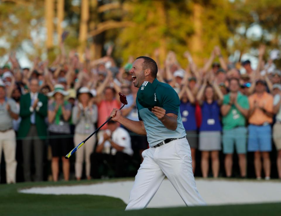  Garcia reacts after his successful birdie putt on the 18th green to win the Masters