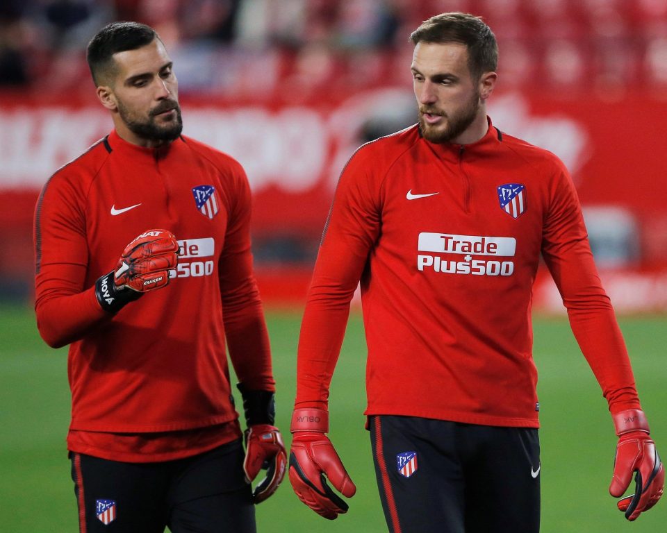  Jan Oblak warms up with hsi Atletico team-mate Miguel Angel Moya admit uncertainty over his future