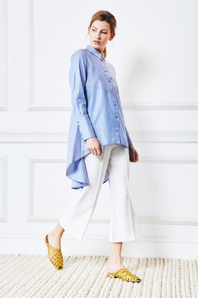  TIP: Balance a billowing shirt with tailored trousers. This shirt skims over hips while still looking polished