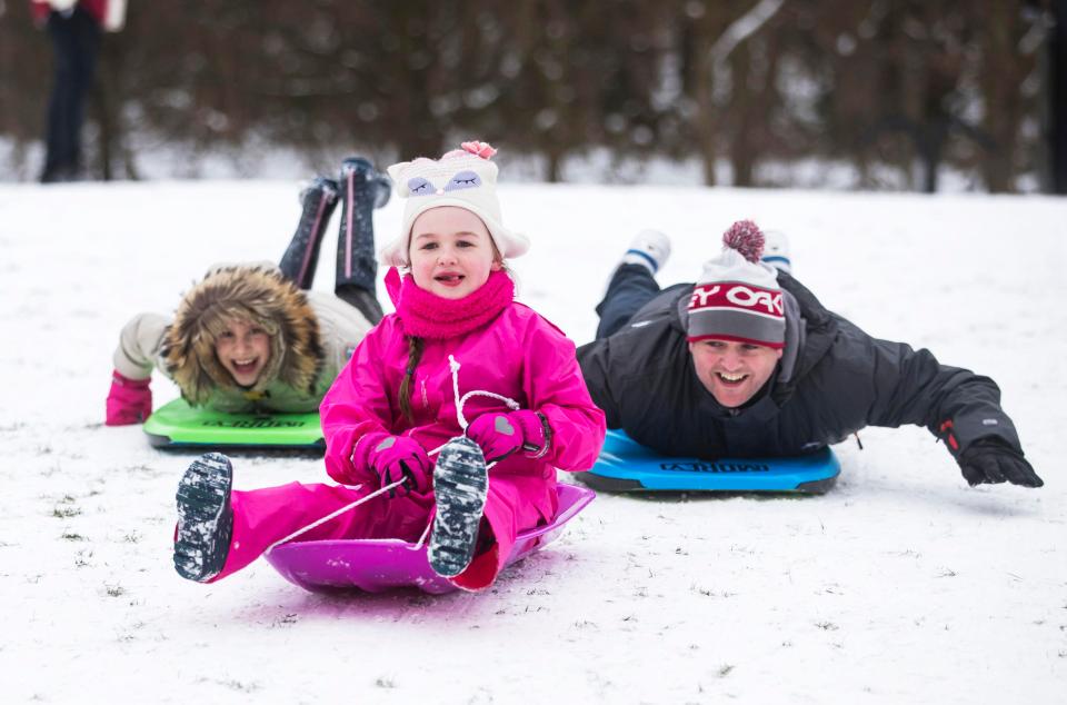  A family sledged in Leeds, as they made the most of the snow brought in by Storm Emma