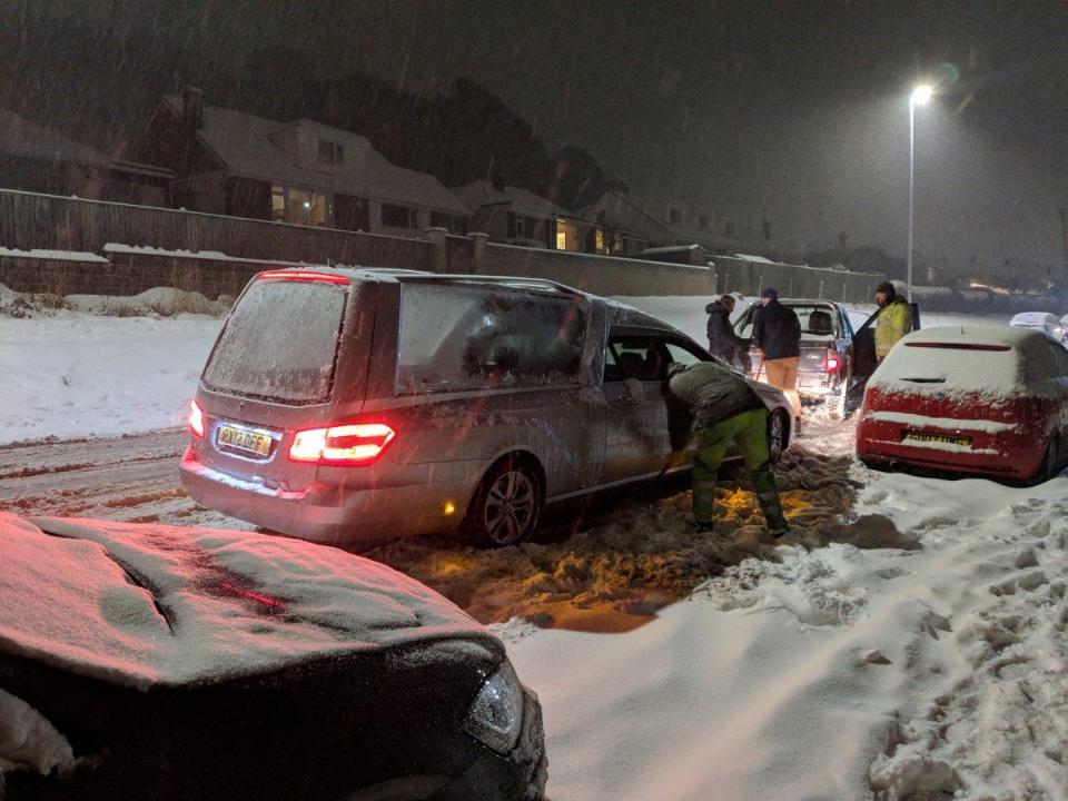  A hearse even got stuck on the weather-ravaged roads