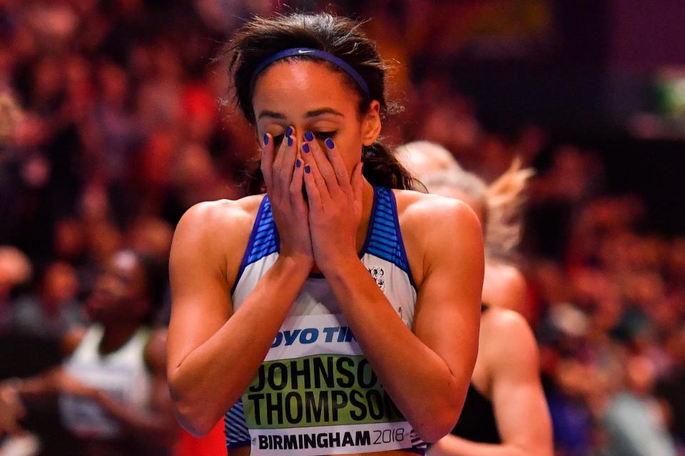  Johnson-Thompson reacts after crossing the line in sublime style