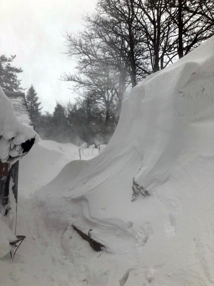  West Linton, in Scotland, where officers had to dig an elderly couple and their two dogs out amid a 12ft snow drift around the house