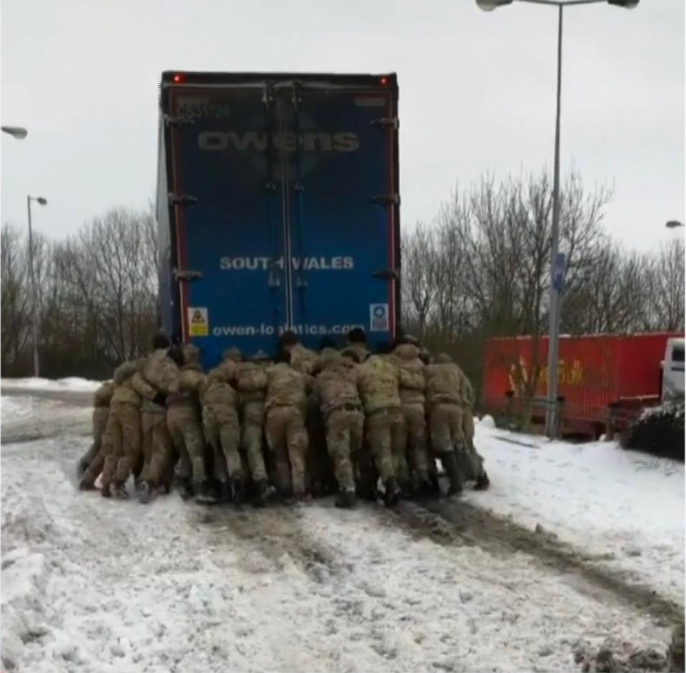  A group of twenty Royal Marines spotted a truck in trouble at Magor Services on the M4 they jumped into action