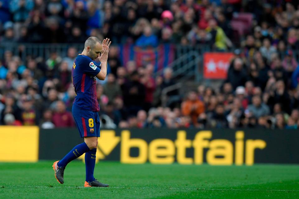  Andres Iniesta leaves the field injured.