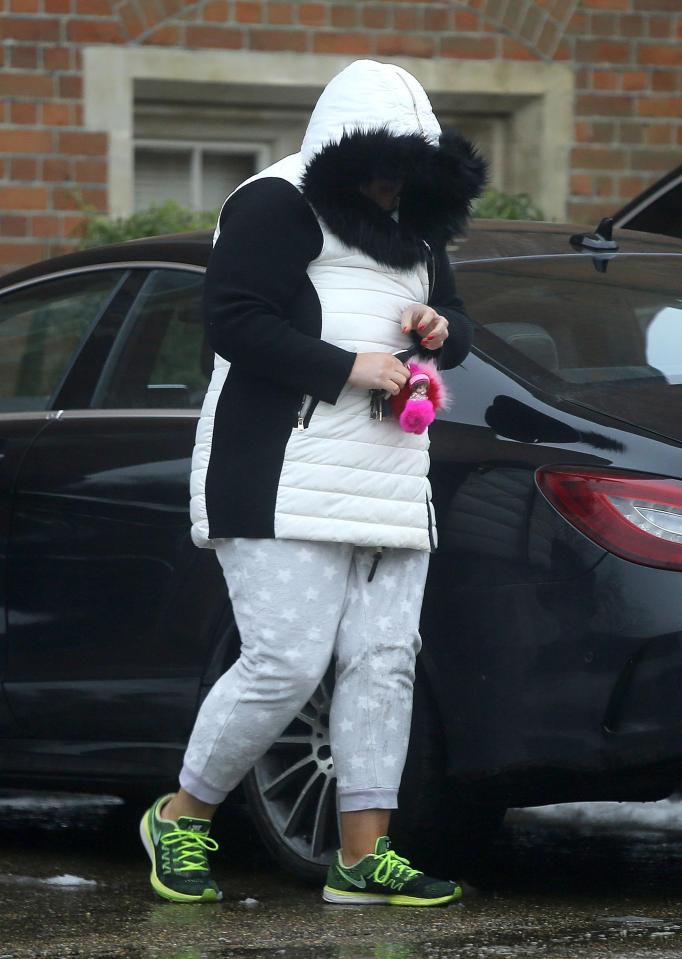  The Towie star covered her face as she walked to her car