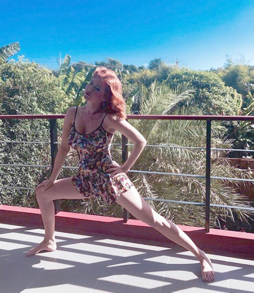  Chapman takes a luxurious stretch against the stunning backdrop on holiday in Thailand