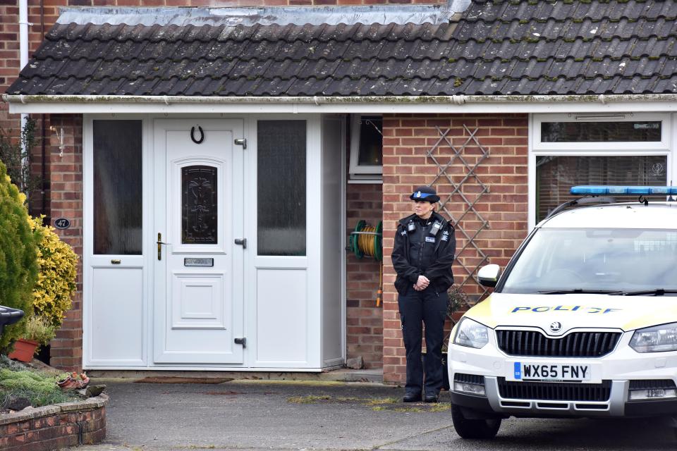  Police stand guard outside a house in Salisbury believed to belong to the ex-Russian spy