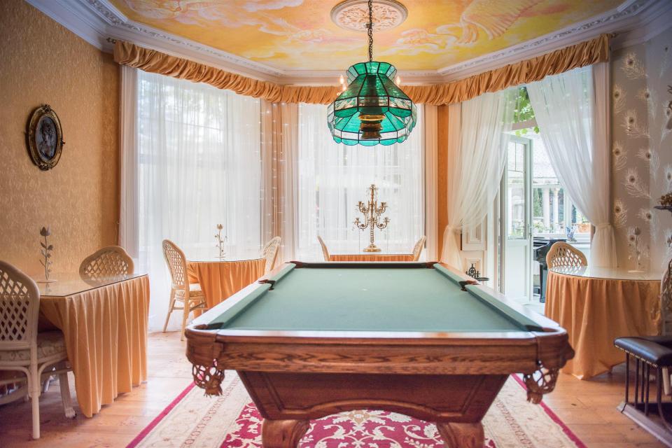  A billiard room occupies space on the ground floor of the romantic bolthole