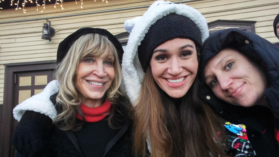 Jace, her mum and sister on a family trip on the Polar Express