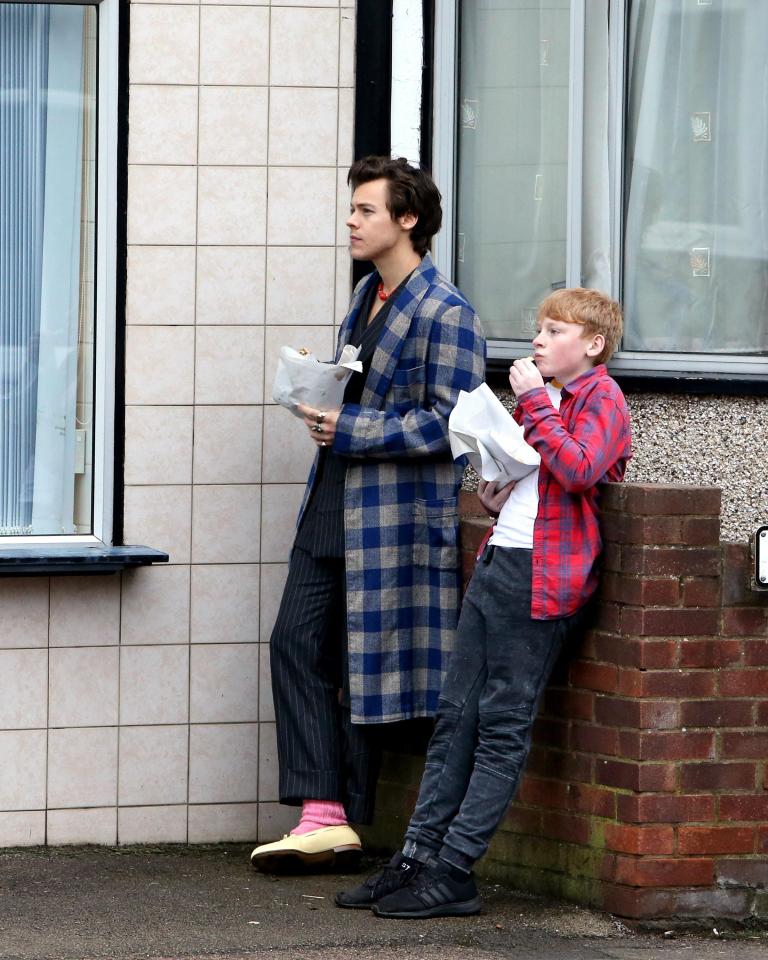  Even in a dressing gown, the former One Directioner proved he can still send fans into a meltdown