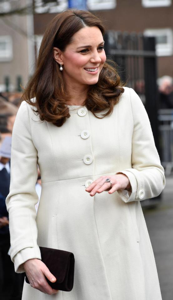  The Duchess of Cambridge smiled as she met with youngsters to hear about the charity's work