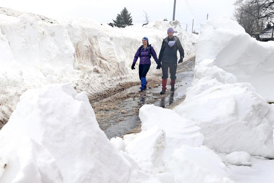  Families in Cumbria still have to negotiate the treacherous slush as the rest of the country is thawing out