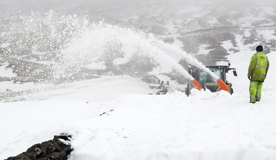  Council workers used snow blowers, ploughs and tractors to reach those mostly in Cumbria on Tuesday