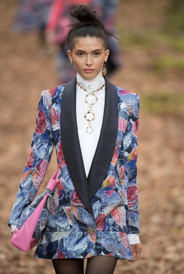  This chic blazer looks great over the simple white top and beads - hopefully a similar design will hit the high street