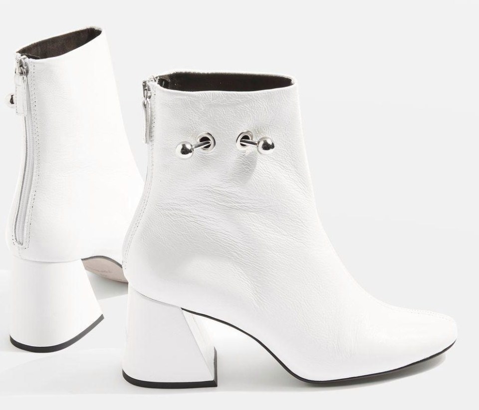 These boots have a simple metal loop and zip back fastening