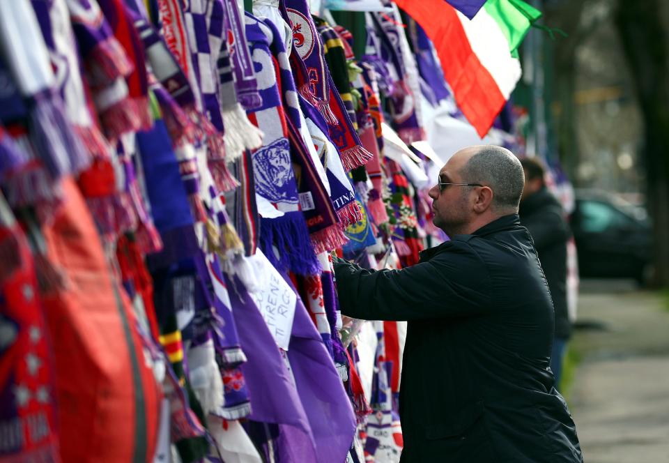 Fans pay tribute to Davide Astori outside Fiorentina's Artemio Franchi stadium