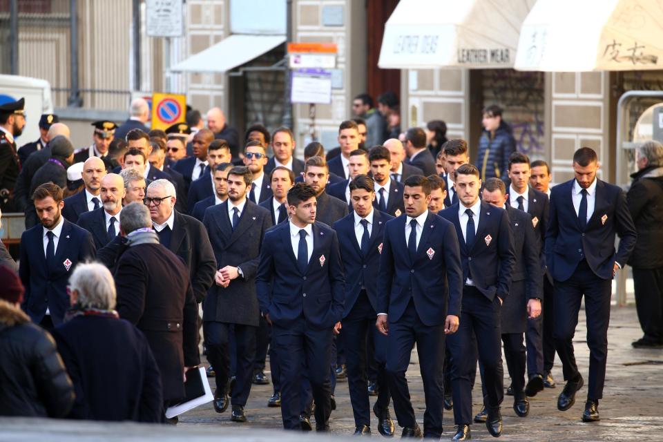 The Fiorentina players arrived together in club suits looking visibly moved by the display of support from fans for the sad occasion