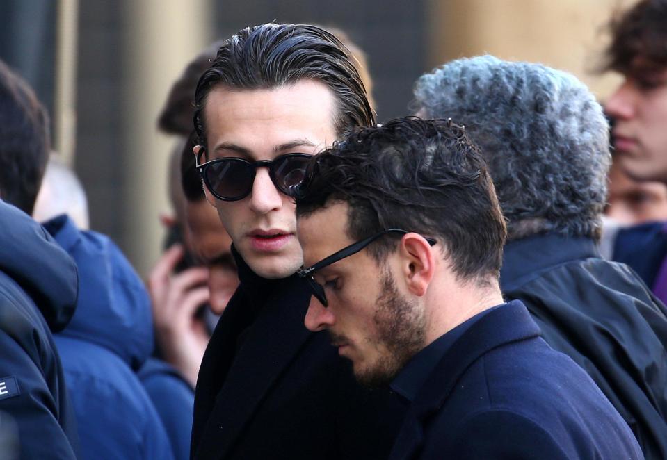 Juventus' Federico Bernardeschi and Alessandro Florenzi of Roma share a quiet word as they arrive at the funeral