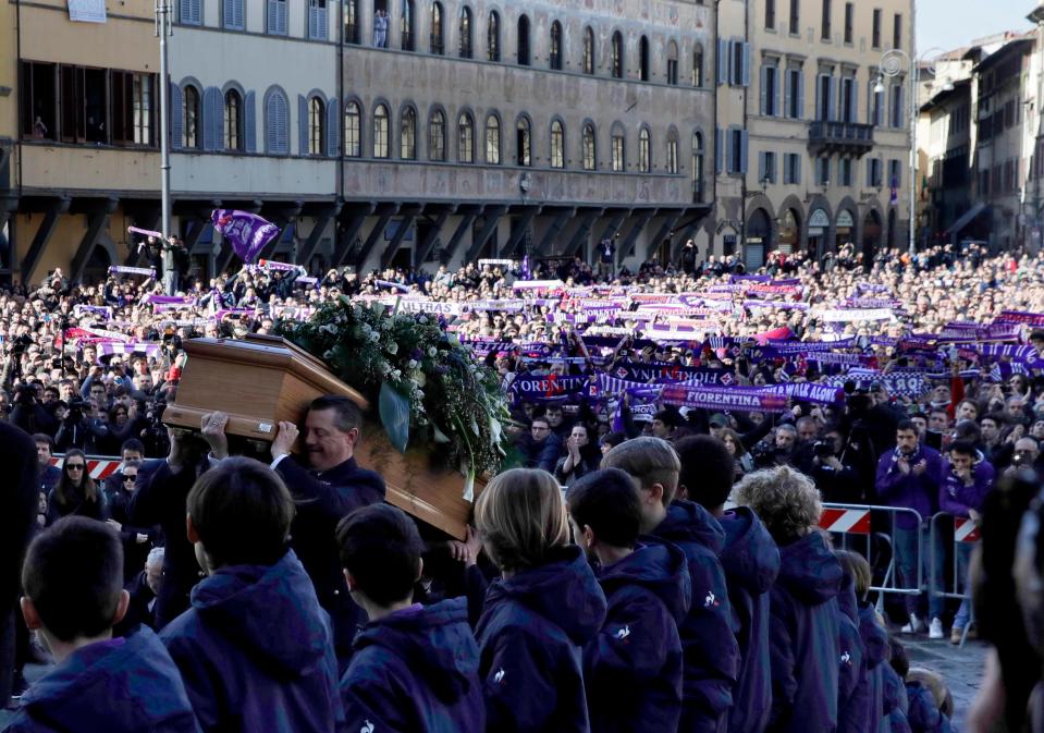 Thousands of Fiorentina fans held their scarves aloft as the coffin arrived at Basilica di Santa Croce